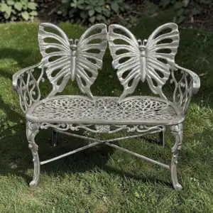 cast aluminum butterfly bench outdoors.webp